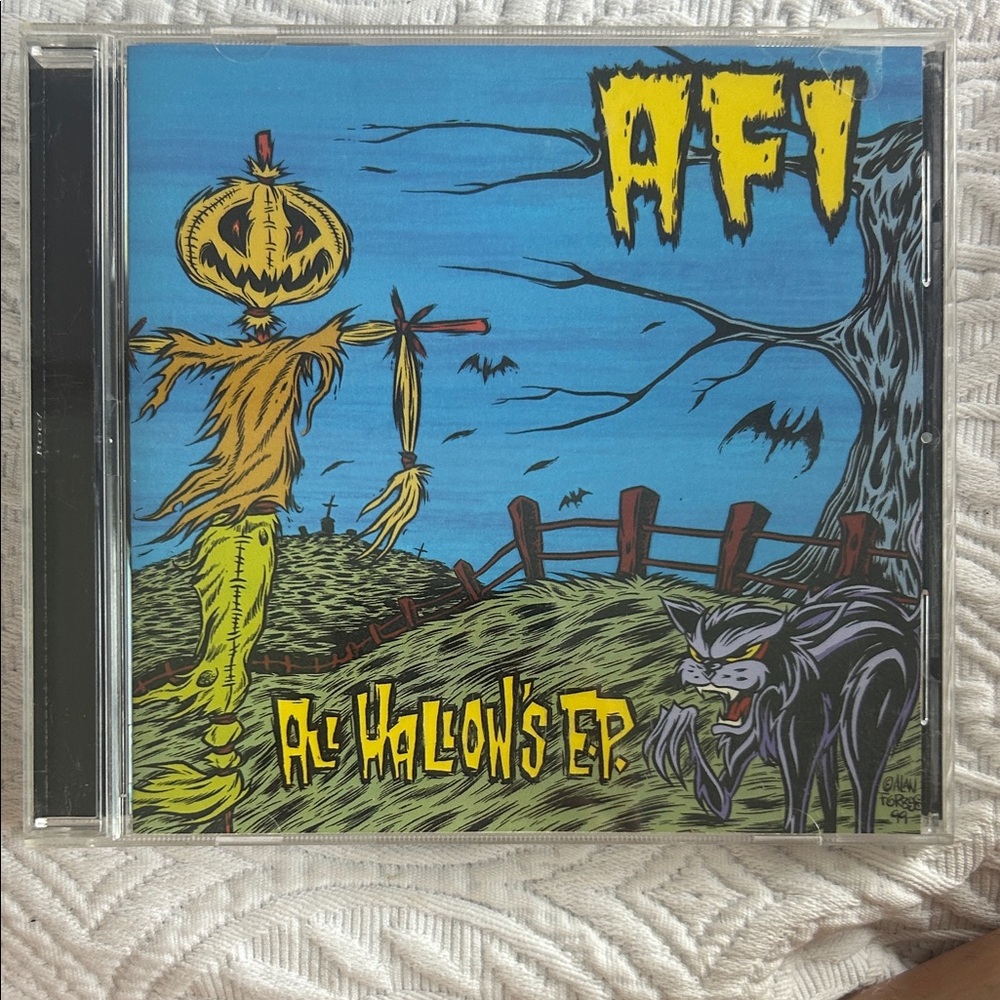 All Hallow's EP CD - Blue and Yellow Cover Art